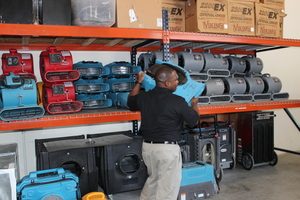 Water Damage Homewood Technician Mobilizing Air Movers